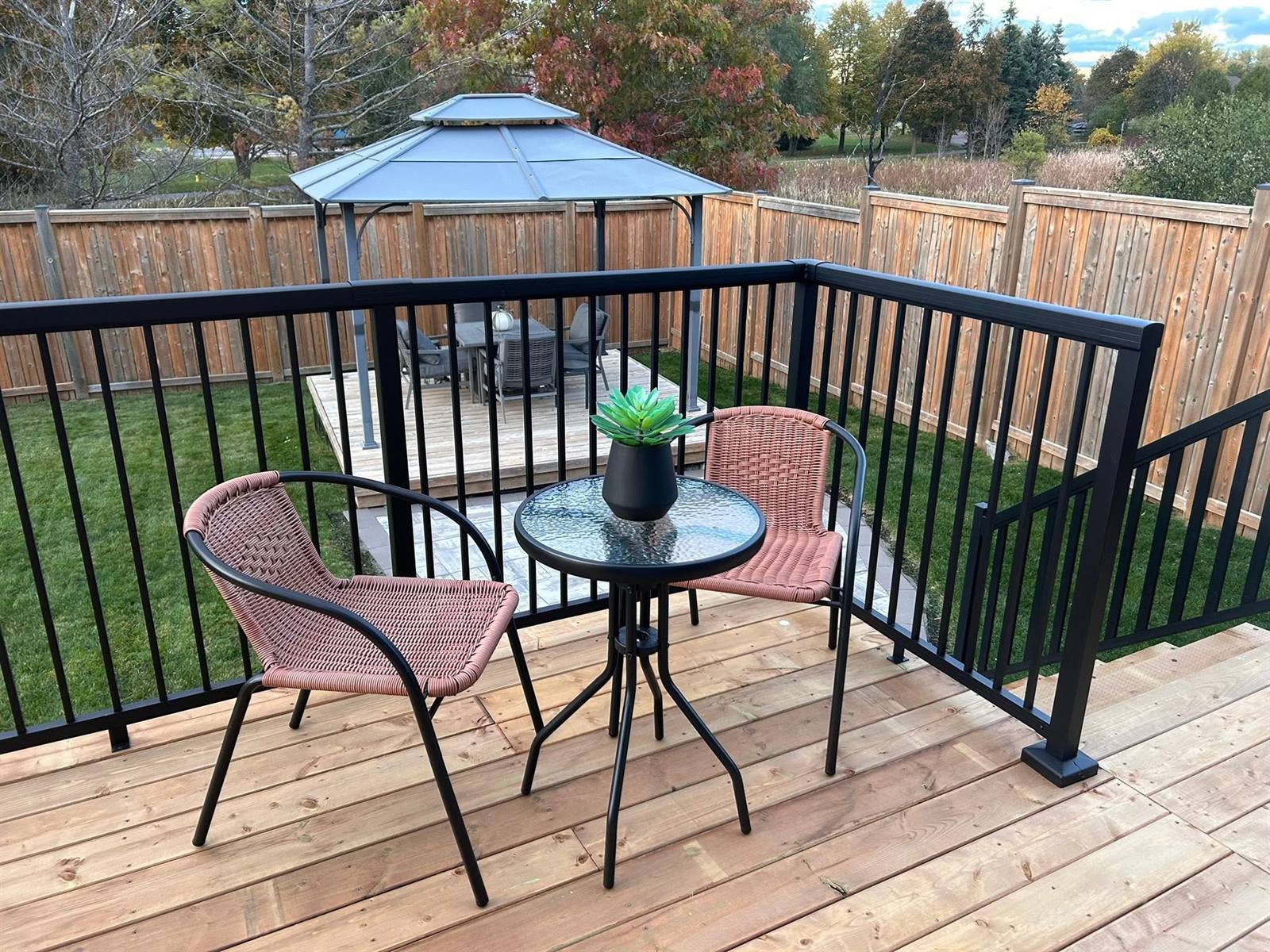 Deck with composite railing built by Gonzo Construction in the Kingston area