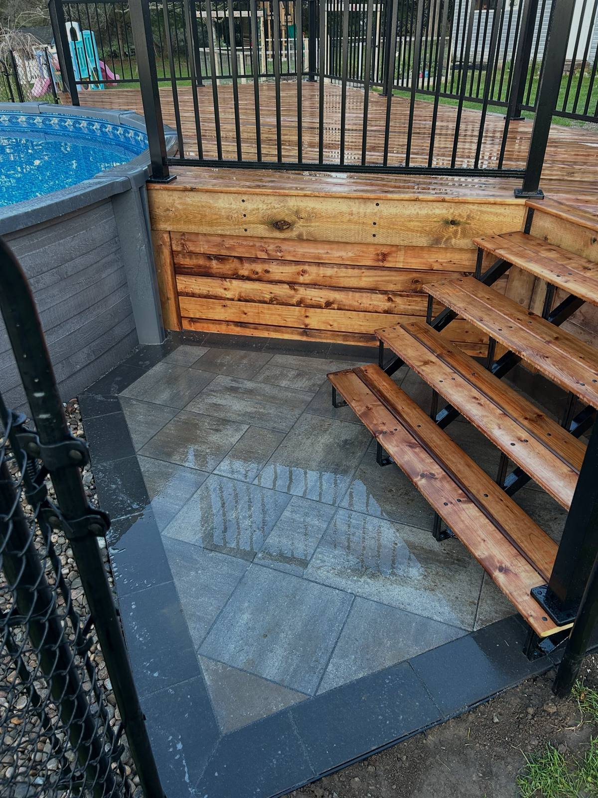 Pool deck with steps built by Gonzo Construction in the Kingston area